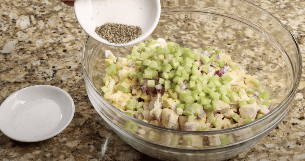 seasoning the salad 